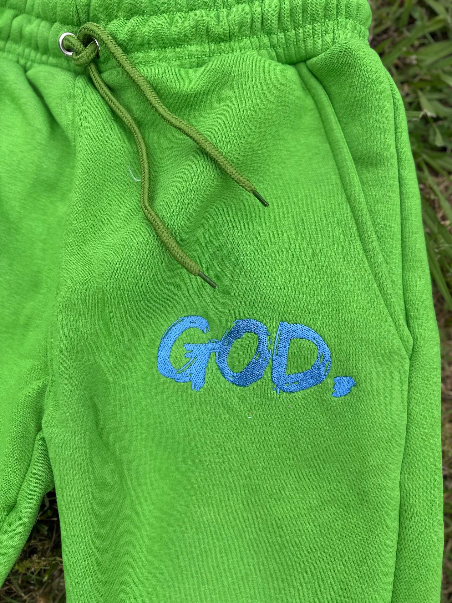 GOD. Crop and Flare Green