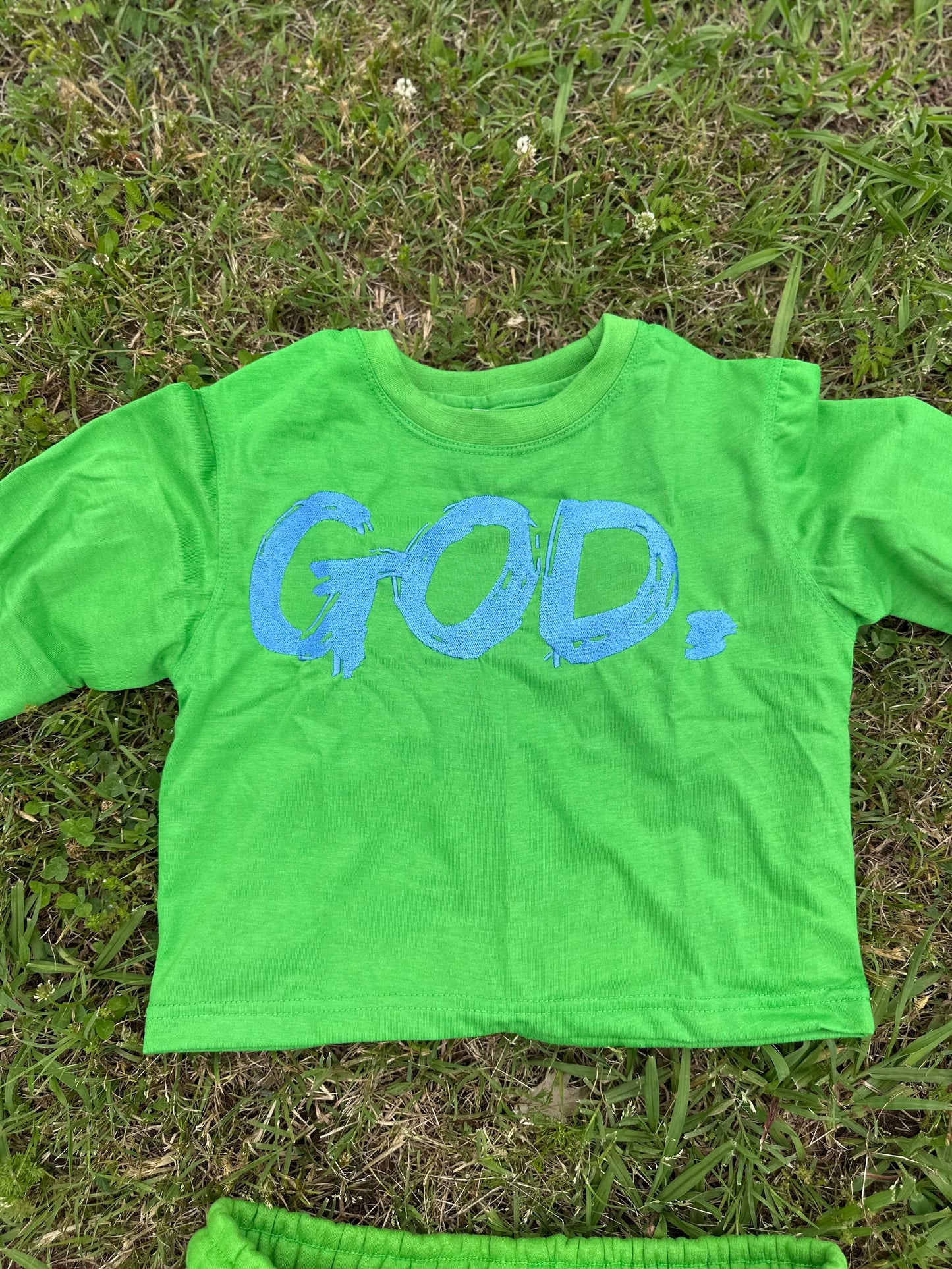 GOD. Crop and Flare Green
